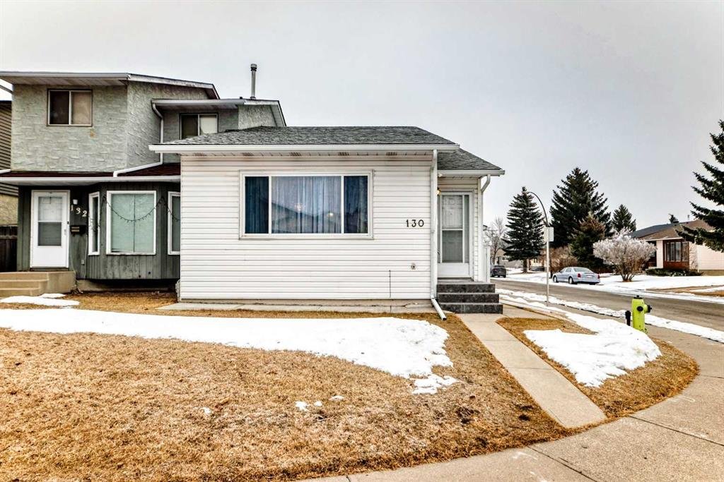 Front exterior of half duplex for sale in Calgary, Alberta